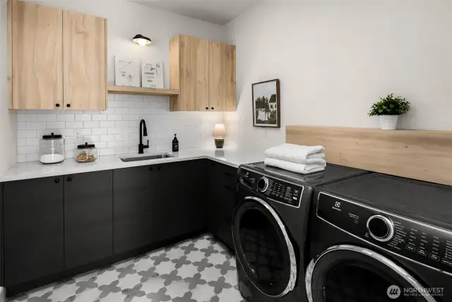 Laundry room on 2nd floor with plenty of storage.