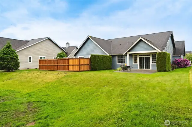 Enjoy the best of outdoor living with a patio that blends seamlessly into a scenic, low-maintenance yard. Peaceful, private, and ready for your favorite chair.