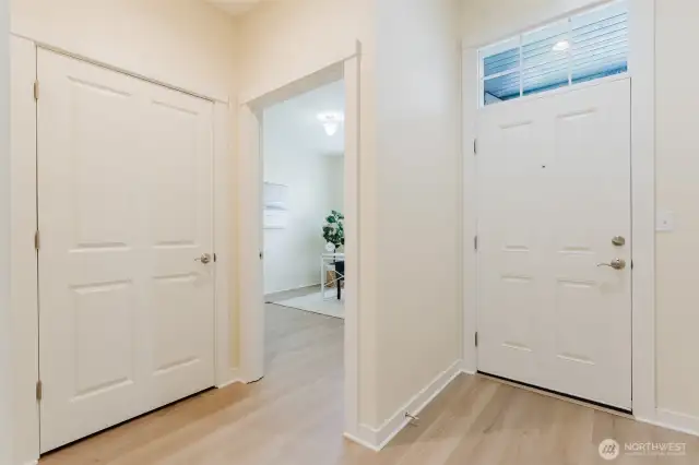 Step into a welcoming entryway featuring a convenient storage closet to help keep everyday essentials close and clutter out of sight.