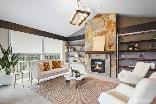 Incredible stonework, fireplace and built ins in the bright and vaulted living room