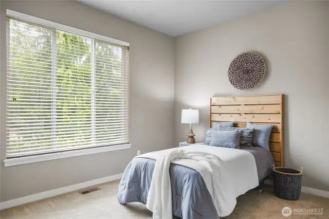 Well-appointed guest bedrooms with generous closet space and tons of natural light.