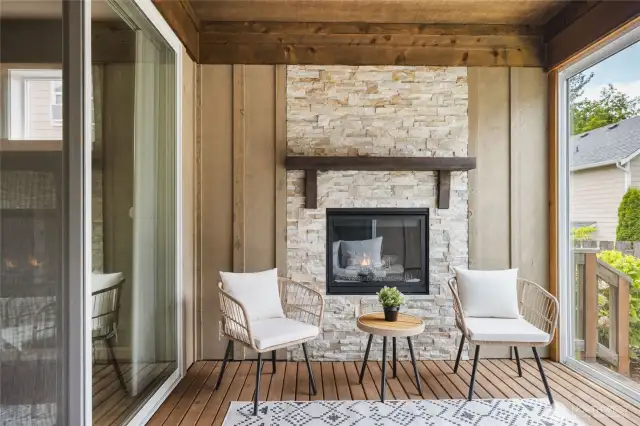 Gas fireplace with dual sliding doors to experience indoor/outdoor living.