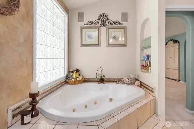 Relax and soak in the jetted tub off the primary bedroom.