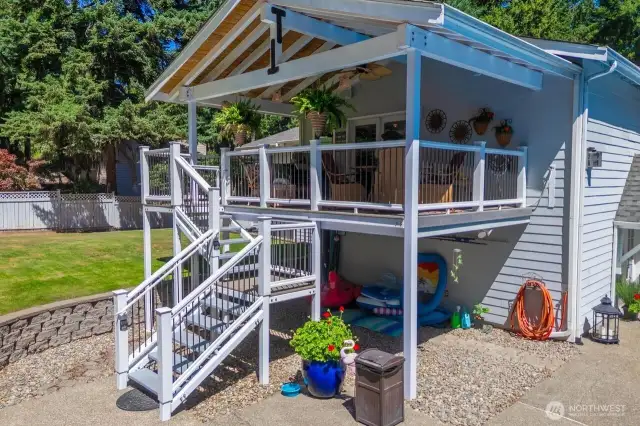 The deck with its iron railings, powdered coated supports and trex decking keeps the maintenance to a minimum. The stair treads are steel and were reclaimed from the convention center!