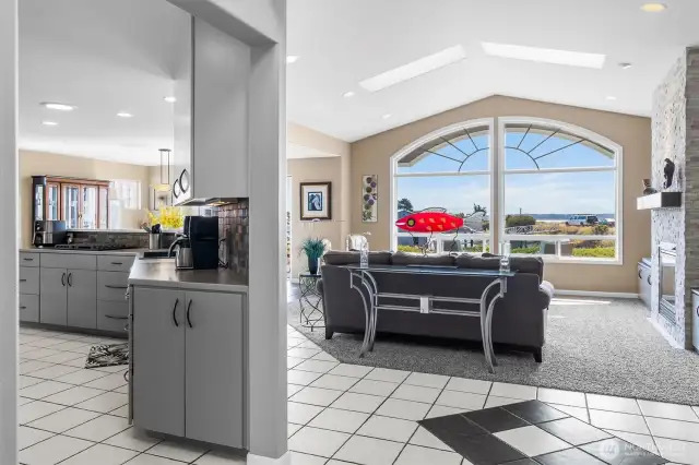 The large entry way flows right into the living area and the kitche.
