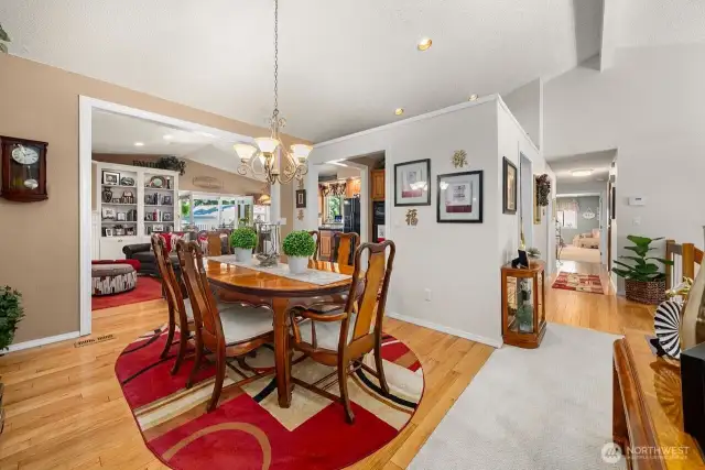 The formal dining room flows easily between the formal living and family room making it a great place for dinner parties and entertaining.  Big enough to fit a farm table and picture open wood floating shelves to finish it off. The extended kitchen would make an amazing butlers pantry!