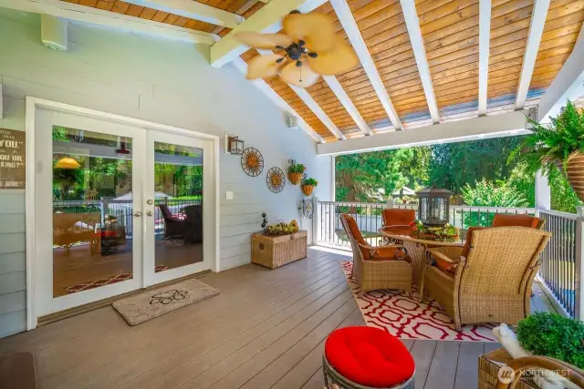 14 x 18 covered deck is built of reclaimed steel, natural wood ceiling with a ceiling fan.  The railings are made of iron  with an industrial feel with easy maintenance. With its covered roof you can enjoy this area during every season.