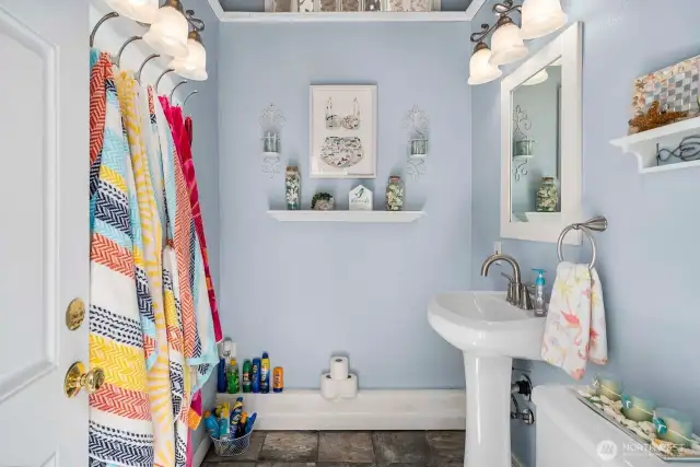 Grab a towel and jump in the pool.  The bath house with its 1/2 bath serves as a changing area and is conveniently located right near the pool.  No need to run in the house its all right here.