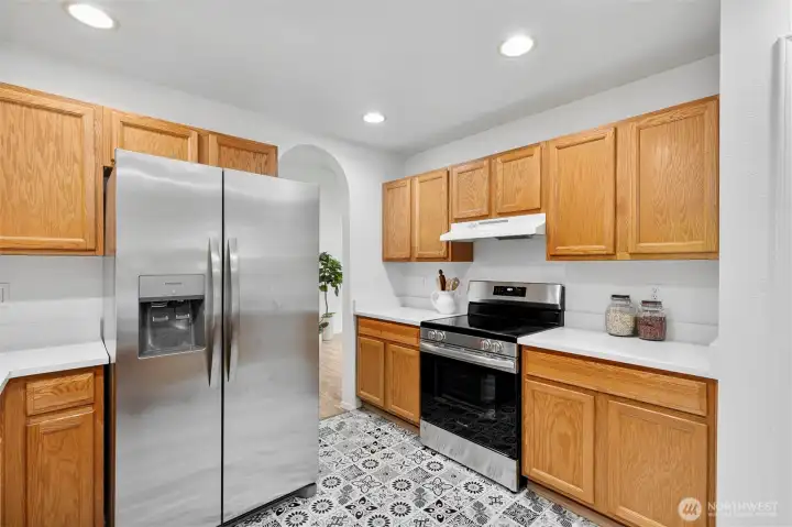Brand new SS appliances, Quartz countertop, SS sink, and flooring.  Enjoy the big walk-in pantry!