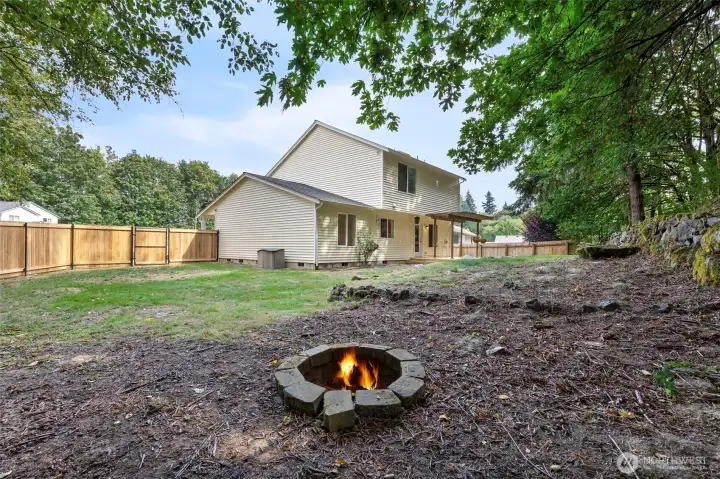 Very private backyard backing up to a lush and beautiful greenbelt area. Check out the new fence...Love the metal posts!