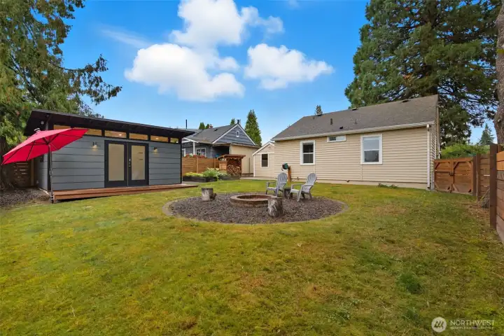 Enjoy evenings around the firepit in this thoughtfully designed outdoor space