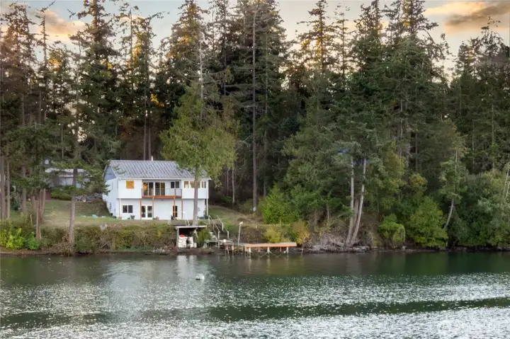 1597 Griffith Point Road featuring a rare dock in Mystery Bay and mooring buoy.