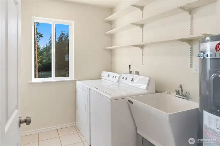 Laundry room w/ plenty of storage