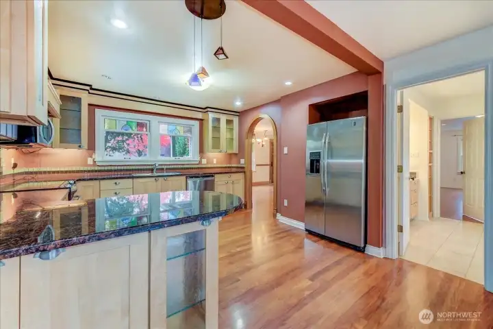 Kitchen looking through to the Family Room and Bathroom