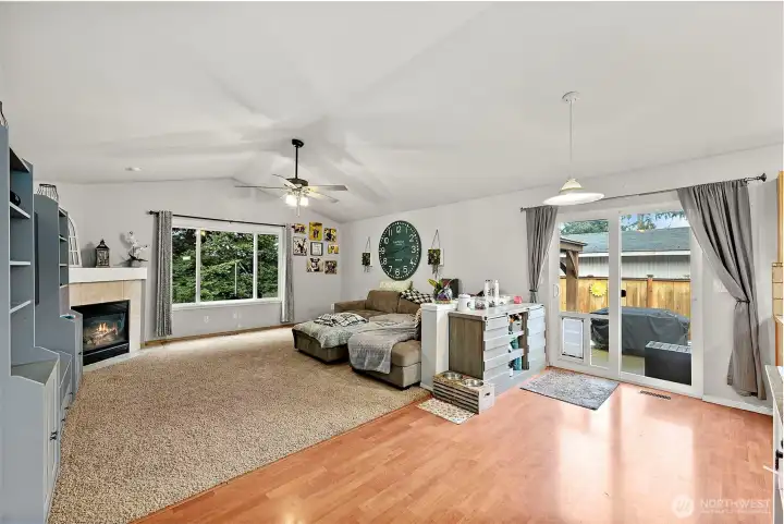 Light-filled open layout with vaulted ceilings that create an inviting sense of space.