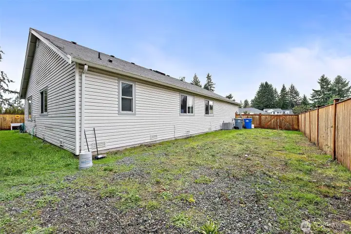 Rare side-yard access with ample room for RV/boat parking and storage.