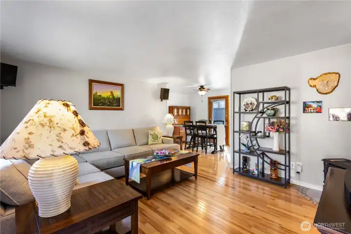 Upon entry, you're greeted by handsome hickory floors and new interior paint.