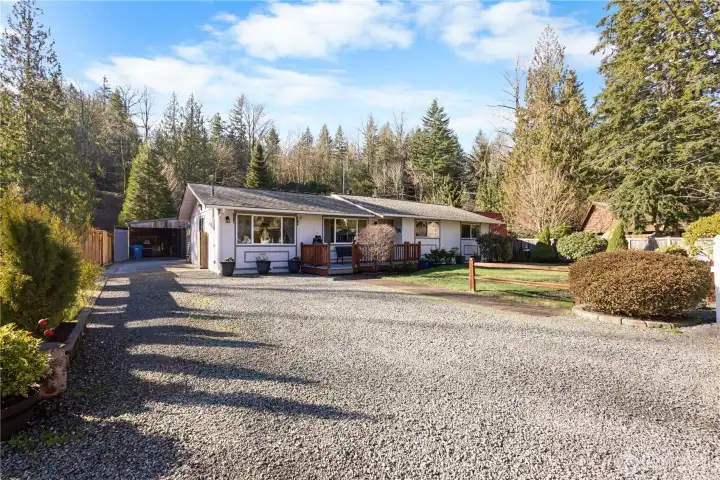 RV, boat, work truck? The long driveway leads to the shop for convenience.