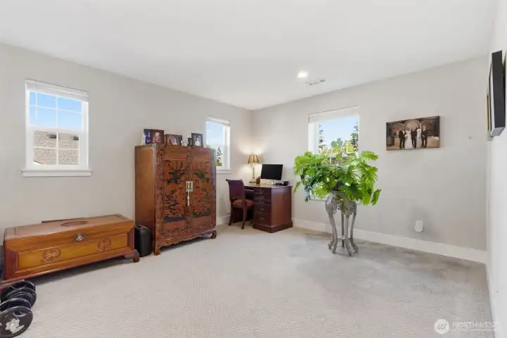 The bonus room includes a dedicated office area, creating the perfect space for working from home or managing daily tasks. Thoughtfully designed for productivity, it offers flexibility while maintaining comfort and style.