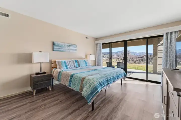 Lower Level Bedroom w/access to patio & lawn