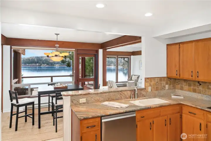 The Granite countertops  compliment the cabinets