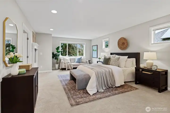 Large Primary Bedroom (Bed #5) with dual sided gas fireplace and spa inspired 5-piece ensuite