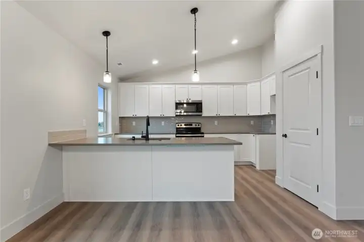 Kitchen with Large Bar Area for Extra Seating