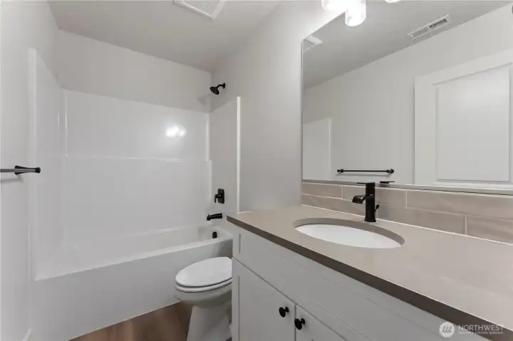Main Bathroom With Granite Countertop