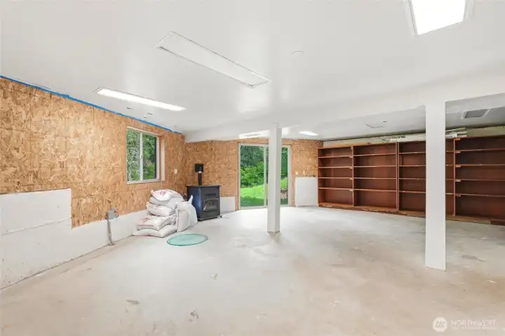 Basement Potential!! Want more bedroom(s)? Former well sump pump, pressure tanks (not in image) and shelving could be removed. 3/4 bath located to the right, outside image.
