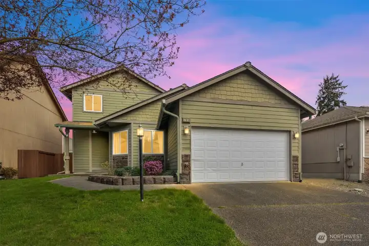 Spacious Garage with Abundant Shelving, Offering Exceptional Storage and Organization