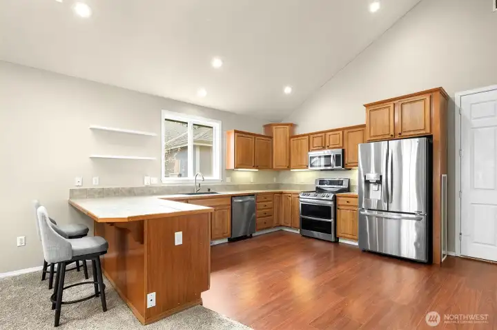 Large Breakfast Bar with Ample Cabinet & Counter Space