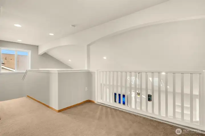 Open Loft Offers Flexible Living - Perfect for Reading, Playtime, or a Homework/Work Zone