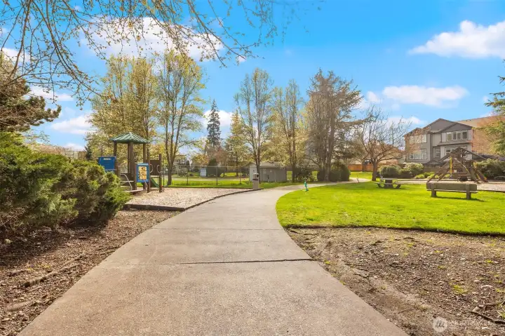 Community Amenities Include a Beautifully Landscaped Park with 2 Playgrounds