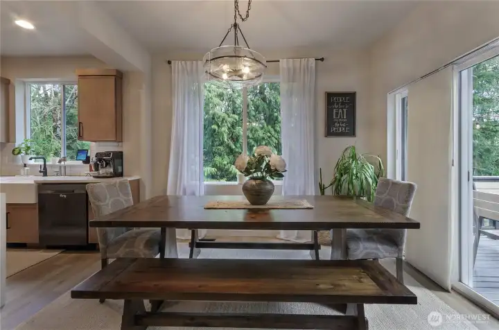 Dining room with greenbelt views