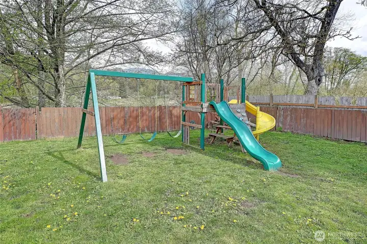 Swing-set stays with house.