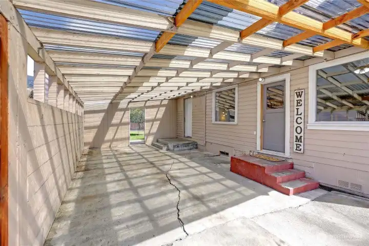 Large covered carport for your vehicle.