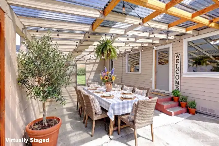 Or use it as an outdoor all season room. This phot is virtually staged.