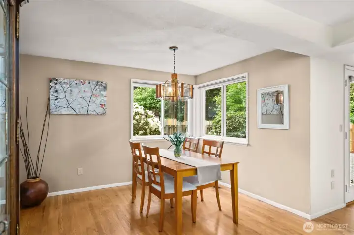 Hardwood floors throughout the kitchen, dining and hall areas.