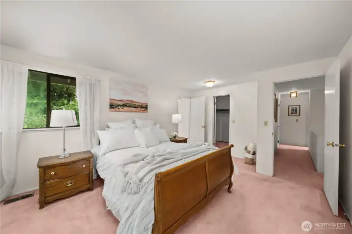 Primary is down the hall from the other bedrooms for privacy.