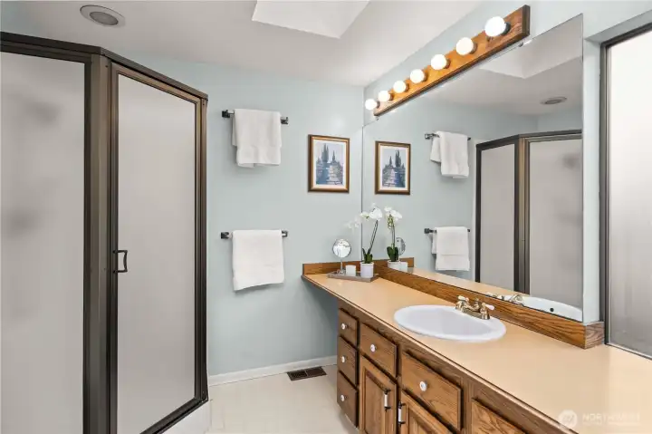 Primary bath with vanity space, bidet, and room for all of your products.