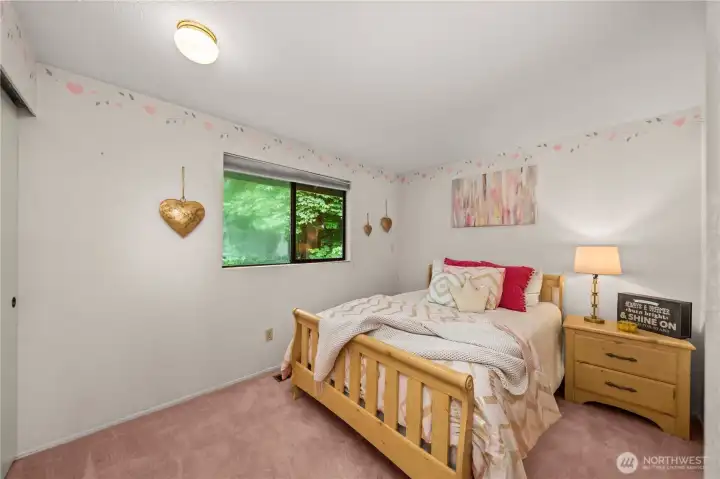 Upstairs bedroom with built-ins
