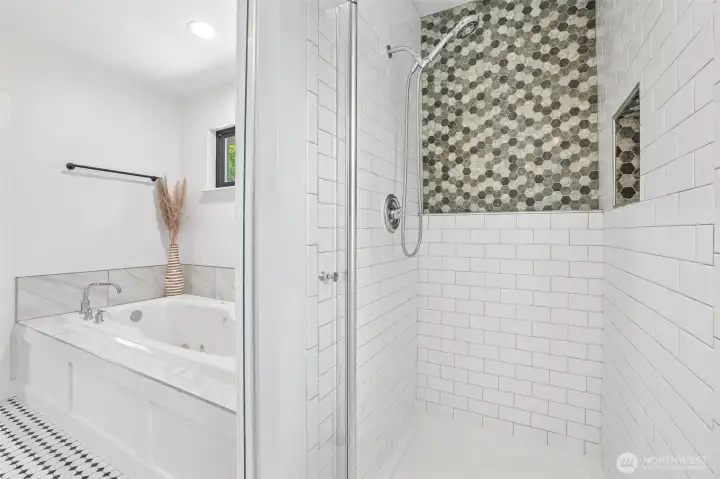 Ensuite has a jetted tub and a Custom tile walk in shower
