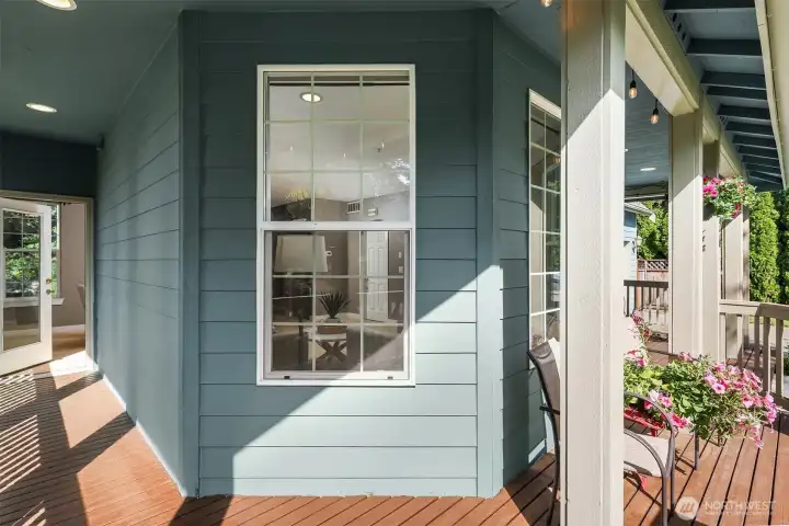 Wraparound front porch with dual access.