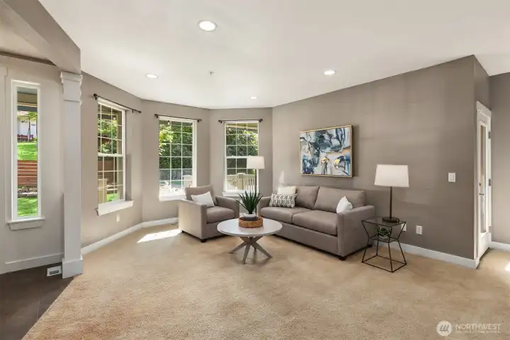 Front entrance with a coat closet to the left and tile flooring.