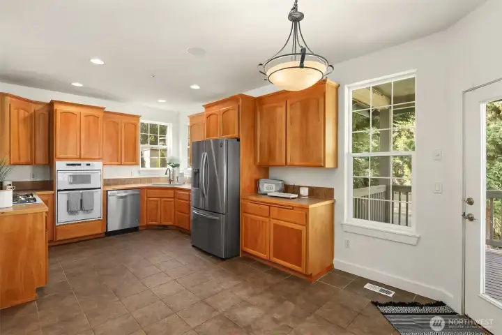 Main floor kitchen with a sitting area.