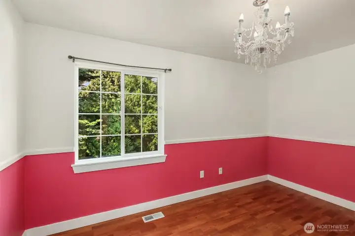 Upper level 3rd bedroom also with laminate and double closet doors.