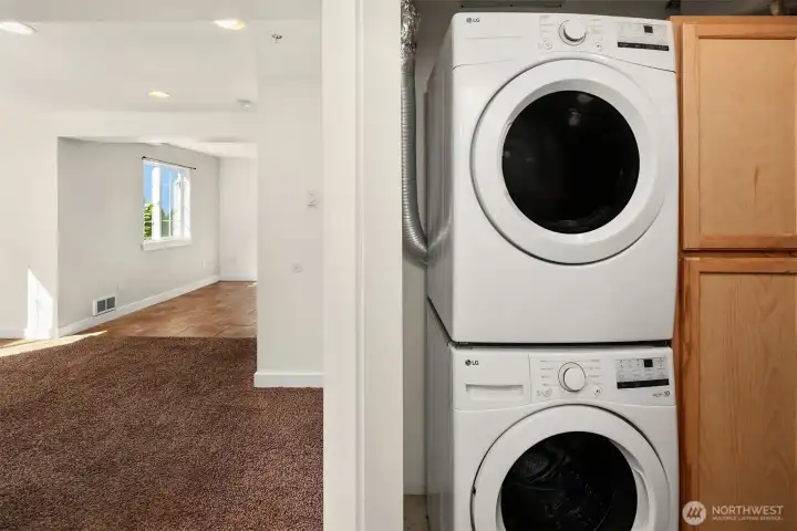 The lower level washer and dryer are located within the utility room.