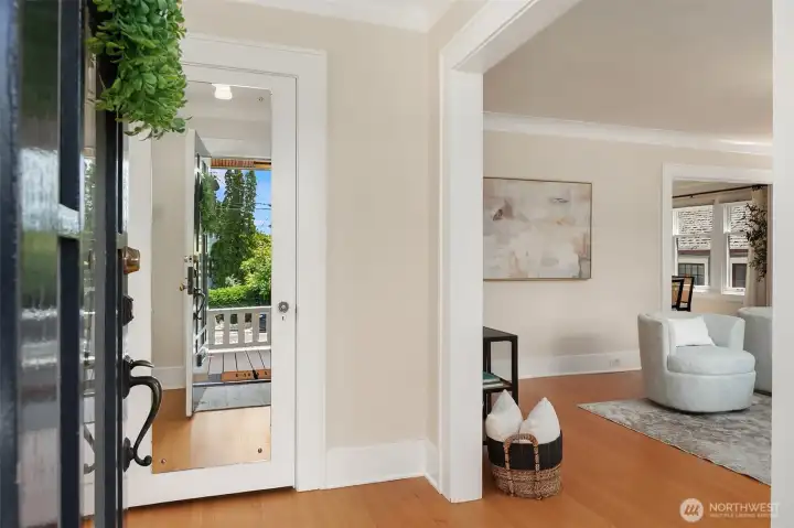 Updated and loved with classic craftsman details through. We love this formal entry before the living room. Updated and loved with classic craftsman details through. We love this formal entry before the living room.