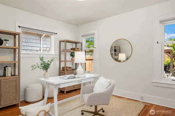 Main level 2nd bedroom shown as a lovely home office. Main level 2nd bedroom shown as a lovely home office.