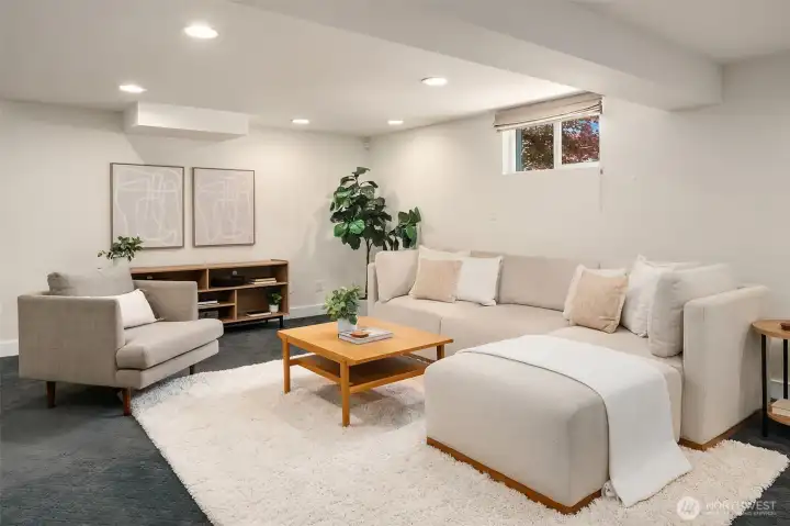 High ceiling basement living area. High ceiling basement living area.